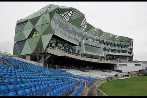 This view of the pavilion from the neighbouring stand shows how the triangular metal cladding wraps around the building